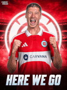 Man in a red soccer jersey celebrates with fists clenched and mouth open, stadium lights behind, 'HERE WE GO' at bottom, sponsor logo visible.