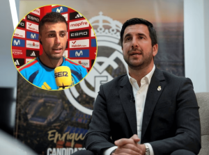Man in a dark suit being interviewed in a studio with a Real Madrid backdrop; inset shows a footballer speaking into a yellow mic.
