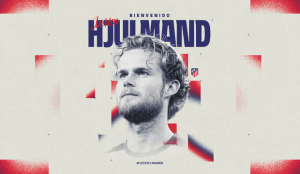 Welcome poster featuring a close-up portrait of a male footballer with bold blue text reading 'Hjulmand' at the top and Atlético Madrid at the bottom, plus a small club crest on the side and red-blue accents.